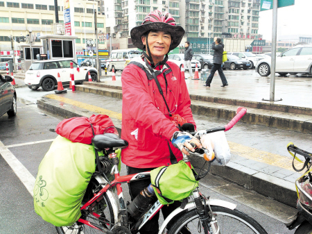 长沙62岁爹爹从最北极骑自行车到海南 - 焦点图