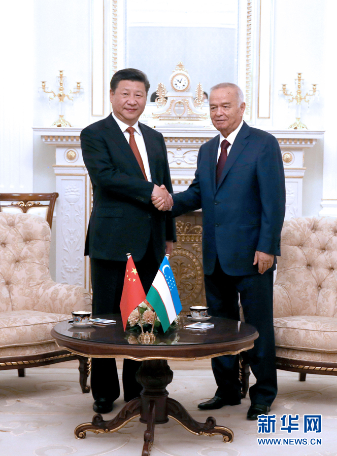 习近平同乌兹别克斯坦总统卡里莫夫举行会谈 两国元首一致决定建立中乌全面战略伙伴关系
