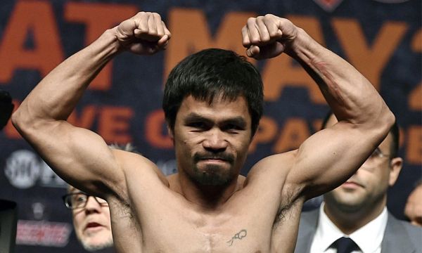 资料图：曾获得八个级别世界金腰带的“亚洲巡洋舰”曼尼·帕奎奥