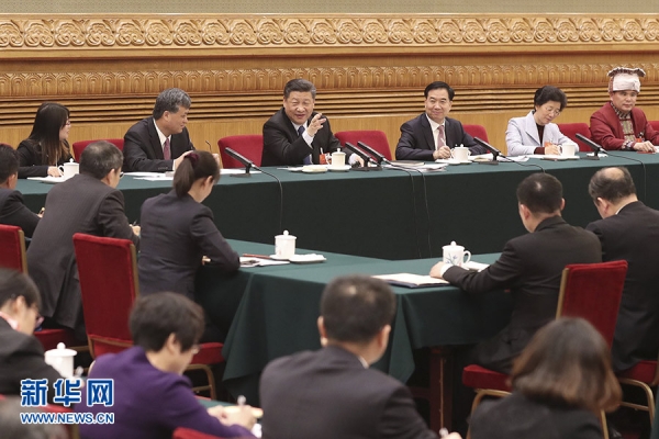 3月7日,中共中央总书记、国家主席、中央军委主席习近平参加十三届全国人大一次会议广东代表团的审议。 新华社发(盛佳鹏 摄)