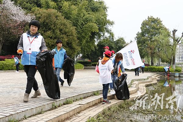 部门联合开展世界水日中国水周护河净滩行