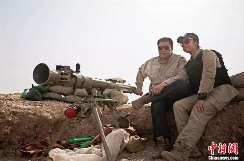 张昕宇和梁红在叙利亚。受访者供图