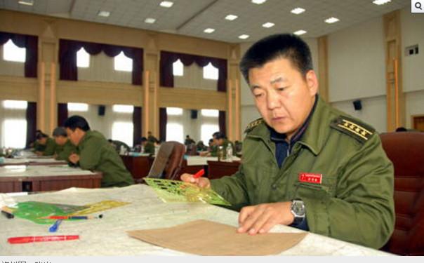 国防部26集团军军长张岩由正军降为副军免职