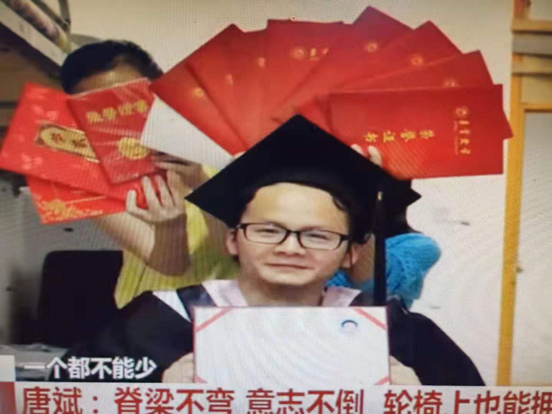 湖南经视新闻：张家界 一个都不能少 唐斌：脊梁不弯 意志不倒 轮椅上也能拥有翱翔梦
