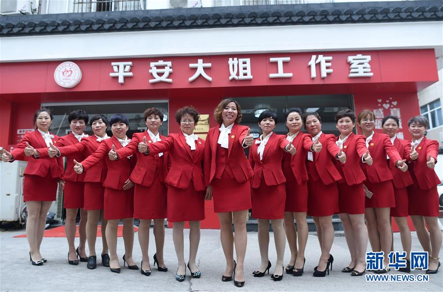 新华社记者 韩传号 摄从"小脚侦缉队"到安保志愿者"朝阳群众",从"