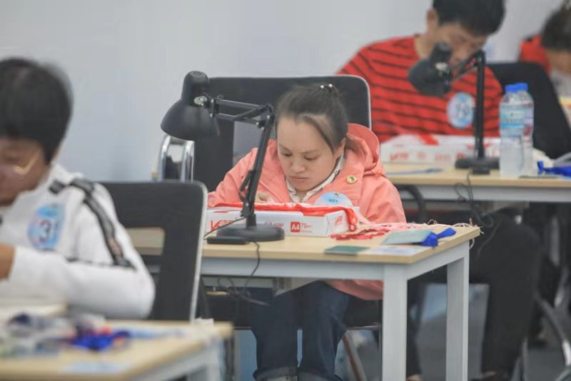 乐雍明：以传技带领残疾人脱贫致富